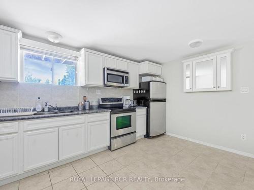 3383 Doane Rd, East Gwillimbury, ON - Indoor Photo Showing Kitchen With Double Sink