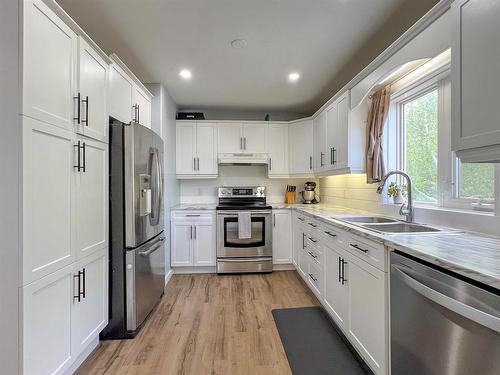 156111 52 Road N, Virden, MB - Indoor Photo Showing Kitchen With Double Sink With Upgraded Kitchen