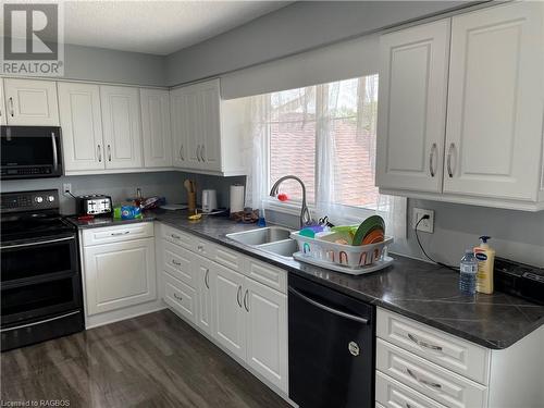 2 Sanctuary Street, Underwood, ON - Indoor Photo Showing Kitchen With Double Sink