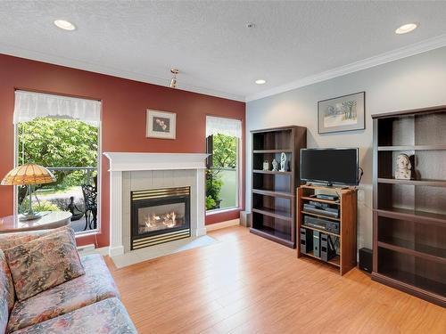 214-405 Quebec St, Victoria, BC - Indoor Photo Showing Living Room With Fireplace