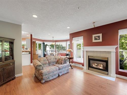 214-405 Quebec St, Victoria, BC - Indoor Photo Showing Living Room With Fireplace