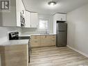 108 Main Street W, Dorintosh, SK  - Indoor Photo Showing Kitchen With Double Sink 