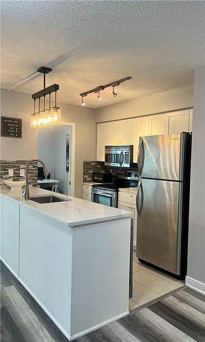 81 Navy Wharf Court|Unit #303, Toronto, ON - Indoor Photo Showing Kitchen With Stainless Steel Kitchen