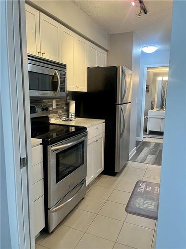 81 Navy Wharf Court|Unit #303, Toronto, ON - Indoor Photo Showing Kitchen With Stainless Steel Kitchen