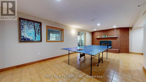 26 Evans Drive, Kawartha Lakes, ON - Indoor With Fireplace