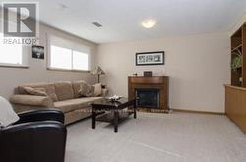 196 Lockhart Drive, St. Catharines, ON - Indoor Photo Showing Living Room With Fireplace