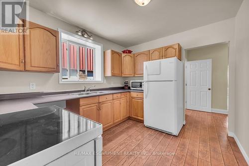 1315 Main Street E, Hamilton, ON - Indoor Photo Showing Kitchen With Double Sink