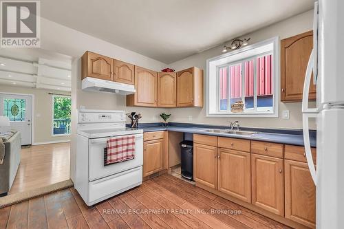 1315 Main Street E, Hamilton, ON - Indoor Photo Showing Kitchen With Double Sink
