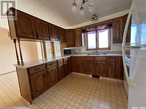 52 Harrigan Crescent, Maple Creek, SK - Indoor Photo Showing Kitchen With Double Sink