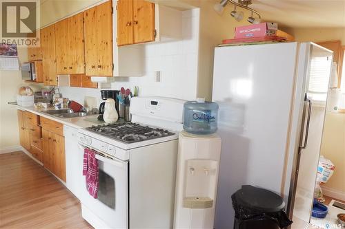 114 5Th Avenue W, Assiniboia, SK - Indoor Photo Showing Kitchen With Double Sink