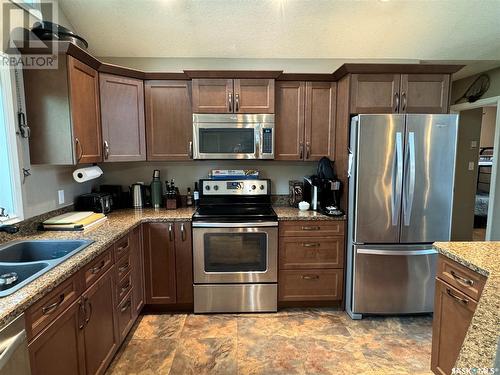 2 307 Birch Street, Lac La Ronge, SK - Indoor Photo Showing Kitchen With Stainless Steel Kitchen With Double Sink