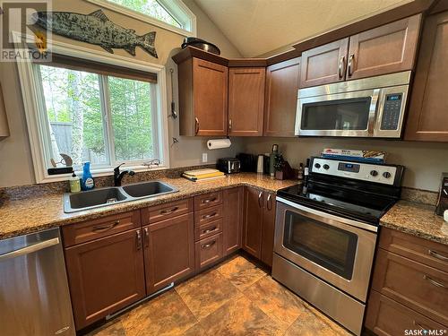 2 307 Birch Street, Lac La Ronge, SK - Indoor Photo Showing Kitchen With Stainless Steel Kitchen With Double Sink