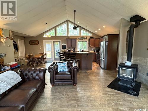 2 307 Birch Street, Lac La Ronge, SK - Indoor Photo Showing Living Room With Fireplace