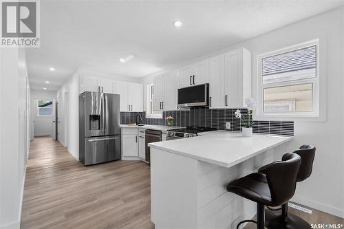 320 H Avenue S, Saskatoon, SK - Indoor Photo Showing Kitchen With Stainless Steel Kitchen With Upgraded Kitchen