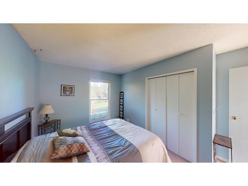 8083 Highway 3/93, Cranbrook, BC - Indoor Photo Showing Bedroom