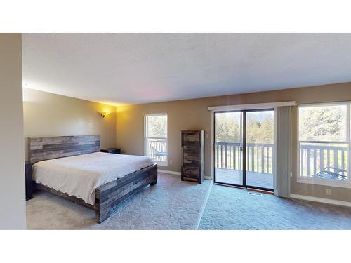 8083 Highway 3/93, Cranbrook, BC - Indoor Photo Showing Bedroom