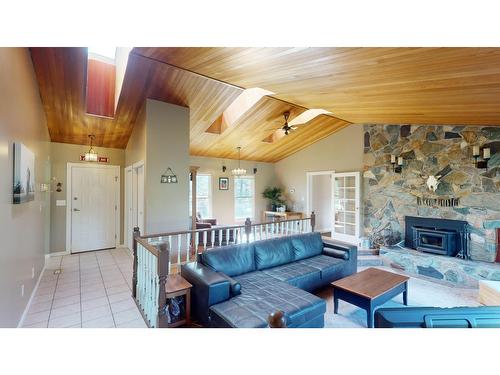 8083 Highway 3/93, Cranbrook, BC - Indoor Photo Showing Living Room With Fireplace