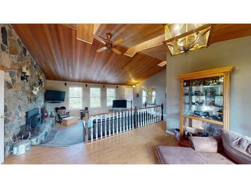 8083 Highway 3/93, Cranbrook, BC - Indoor Photo Showing Living Room With Fireplace