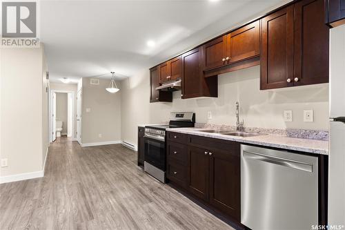 373 Halifax Street, Regina, SK - Indoor Photo Showing Kitchen With Double Sink