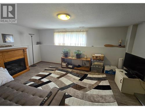 4704 Weber Avenue, Terrace, BC - Indoor Photo Showing Other Room With Fireplace