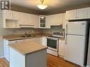4946 Marigold Drive, Regina, SK  - Indoor Photo Showing Kitchen With Double Sink 