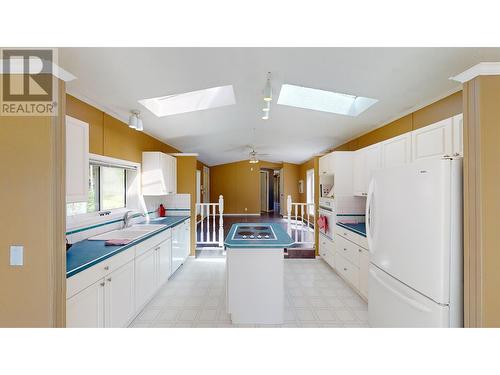 1955 Roan Road, Quesnel, BC - Indoor Photo Showing Kitchen With Double Sink