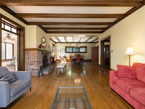 Salon - 150 Av. Brock S., Montréal-Ouest, QC - Indoor Photo Showing Living Room With Fireplace