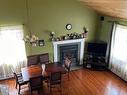 Living room - 61 Rue Lajoie, Châteauguay, QC  - Indoor With Fireplace 