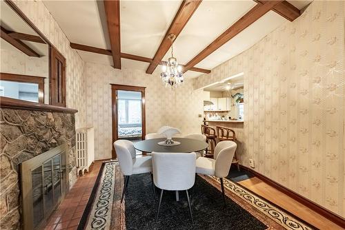 24 Burris Street, Hamilton, ON - Indoor Photo Showing Dining Room With Fireplace