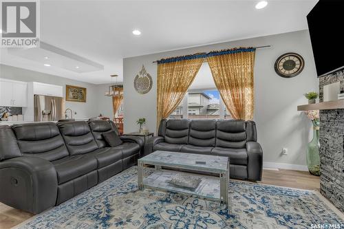 239 Baltzan Boulevard, Saskatoon, SK - Indoor Photo Showing Living Room With Fireplace