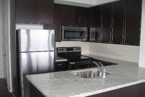 2411-385 Prince Of Wales Dr, Mississauga, ON - Indoor Photo Showing Kitchen With Upgraded Kitchen