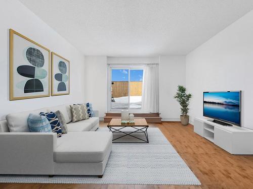 Den - 410-4475 Boul. St-Jean, Dollard-Des-Ormeaux, QC - Indoor Photo Showing Living Room