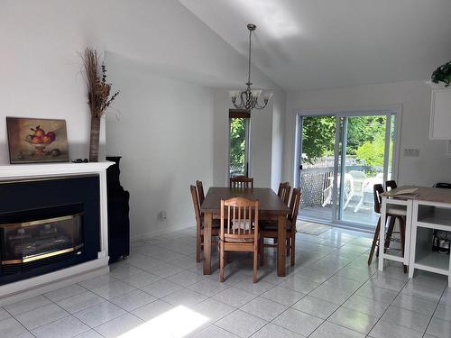 Salle Ã  manger - 8075 8E Allée, Drummondville, QC - Indoor Photo Showing Dining Room With Fireplace