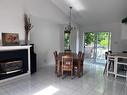 Salle Ã  manger - 8075 8E Allée, Drummondville, QC  - Indoor Photo Showing Dining Room With Fireplace 