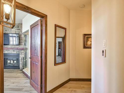 Passageway - 4-250 Rue Du Mont-Plaisant, Mont-Tremblant, QC - Indoor Photo Showing Other Room With Fireplace