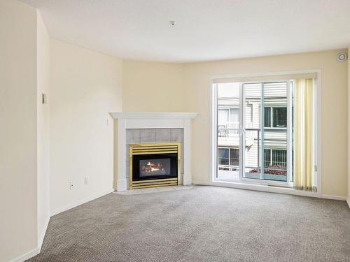 205C-540 Al Wilson Grove, Duncan, BC - Indoor Photo Showing Living Room With Fireplace