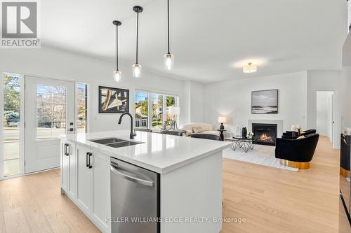 4 Santa Barbara Lane, Halton Hills, ON - Indoor Photo Showing Kitchen With Fireplace With Double Sink