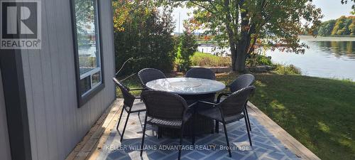 115 Rollies Bay Road, Curve Lake First Nation 35, ON - Outdoor With Body Of Water With Deck Patio Veranda