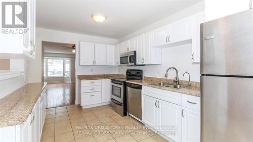 1920 Ashwood Avenue, Innisfil, ON - Indoor Photo Showing Kitchen With Double Sink