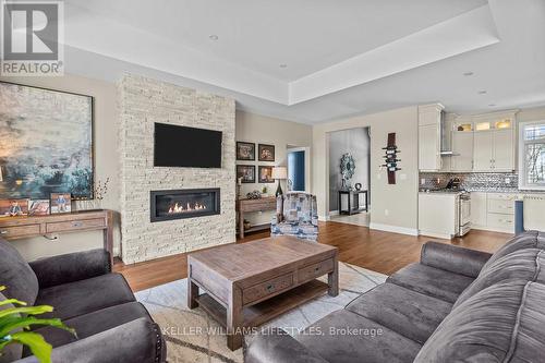 4657 Lakeside Street, Plympton-Wyoming, ON - Indoor Photo Showing Living Room With Fireplace