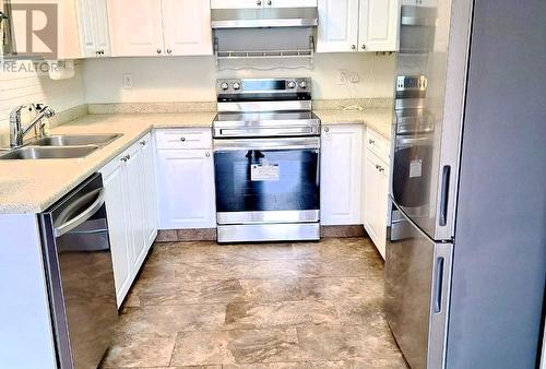 160 Celano Crescent Unit# 104, Kelowna, BC - Indoor Photo Showing Kitchen With Stainless Steel Kitchen With Double Sink