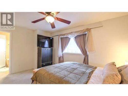 160 Celano Crescent Unit# 104, Kelowna, BC - Indoor Photo Showing Bedroom