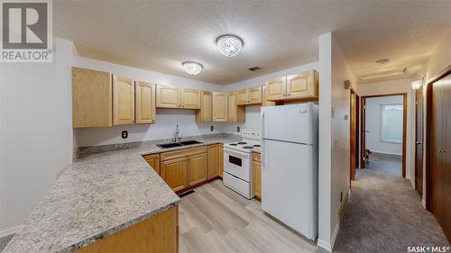 1404 Wascana Street, Regina, SK - Indoor Photo Showing Kitchen With Double Sink