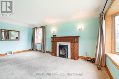 267 East 12Th Street, Hamilton, ON - Indoor Photo Showing Living Room With Fireplace