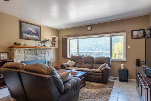 2465 Highway 3A, Nelson, BC - Indoor Photo Showing Living Room With Fireplace