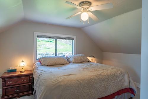 2465 Highway 3A, Nelson, BC - Indoor Photo Showing Bedroom