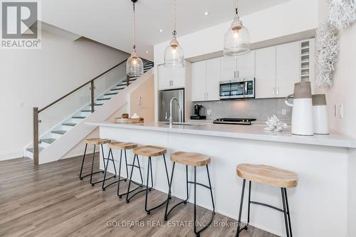 97 - 3771 Riva Avenue, Innisfil, ON - Indoor Photo Showing Kitchen With Upgraded Kitchen