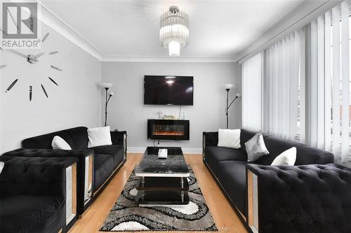 1829 Drouillard Road, Windsor, ON - Indoor Photo Showing Living Room With Fireplace