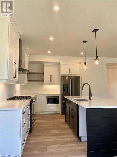 Picture of a Torbay model built in Phase 1 - 27 Lakeforest Drive Unit# Lot 28, Saugeen Shores, ON - Indoor Photo Showing Kitchen With Upgraded Kitchen