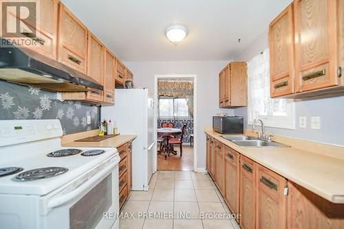 57 Mercedes Drive W, Toronto, ON - Indoor Photo Showing Kitchen With Double Sink